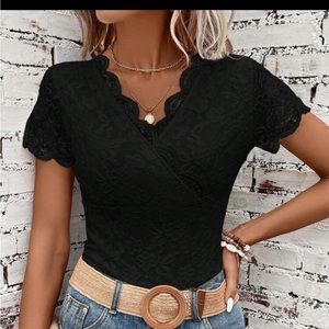 Black scalloped bodysuit never worn